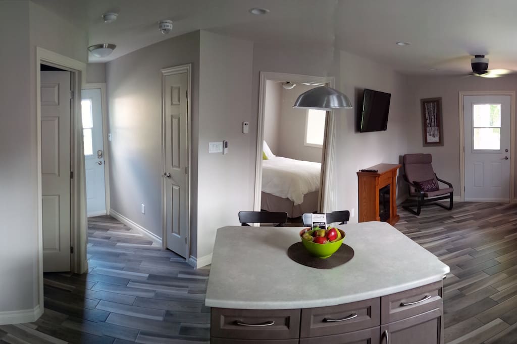 Open concept with island breakfast bar.