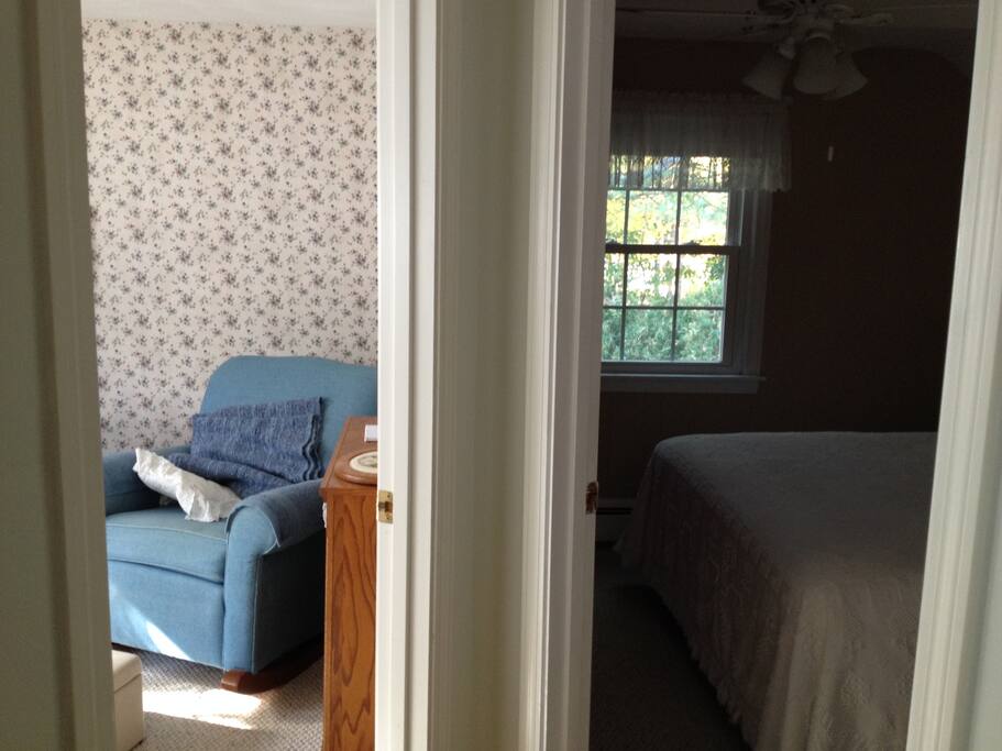From the hallway, looking toward the sitting room on the left, and bedroom on the right.