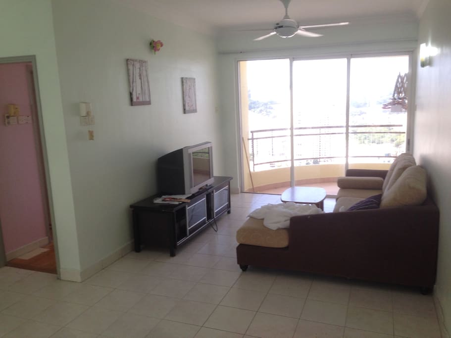 Living room with sea view balcony.