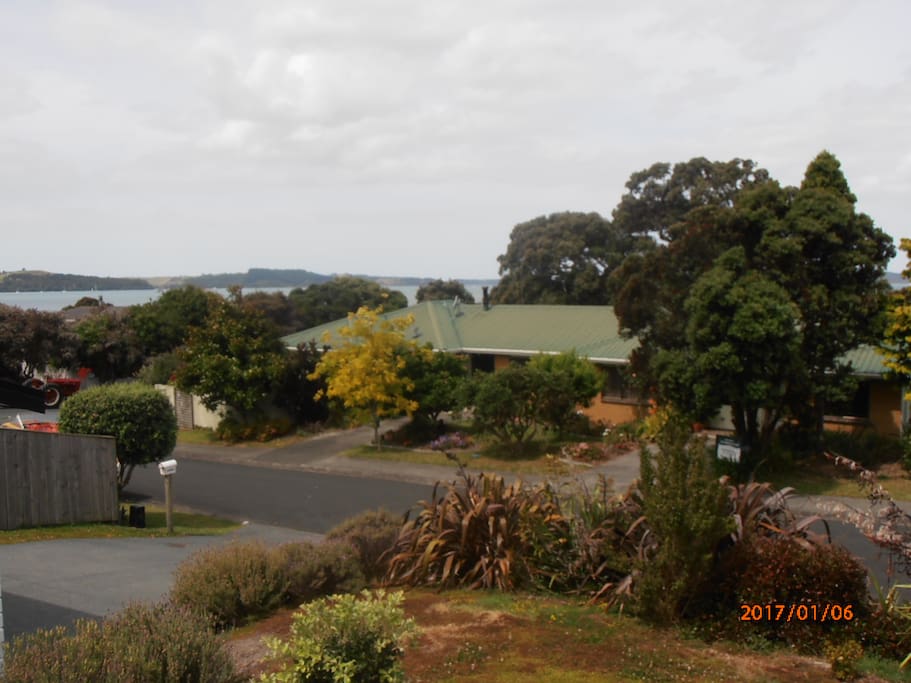 The front of the flat with Kawau Bay beyond.