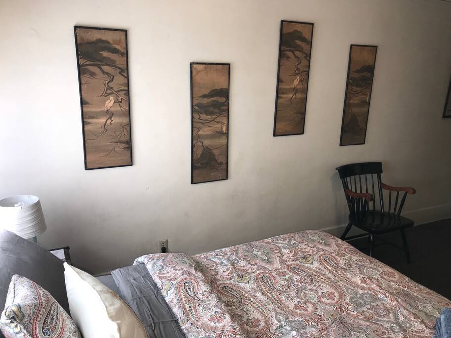 Vintage art and furnishings add charm and comfort.