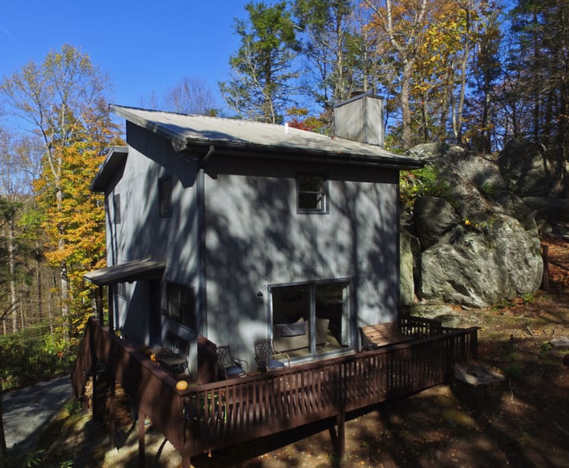 Wrap-around porch to sit and enjoy nature. Winter view of Grandfather Mountain from this side of house.