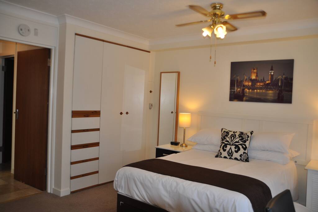 Bed Area with Storage & Safe and Iron