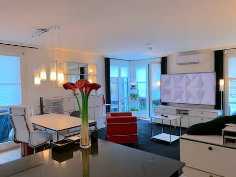 Top Airbnb: Designer apartment with air conditioning & large terrace in Alt Wiedikon
