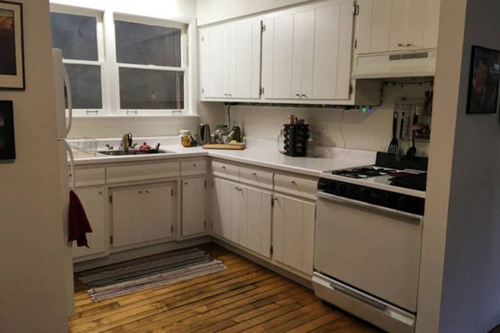 Fully stocked, shared kitchen area.