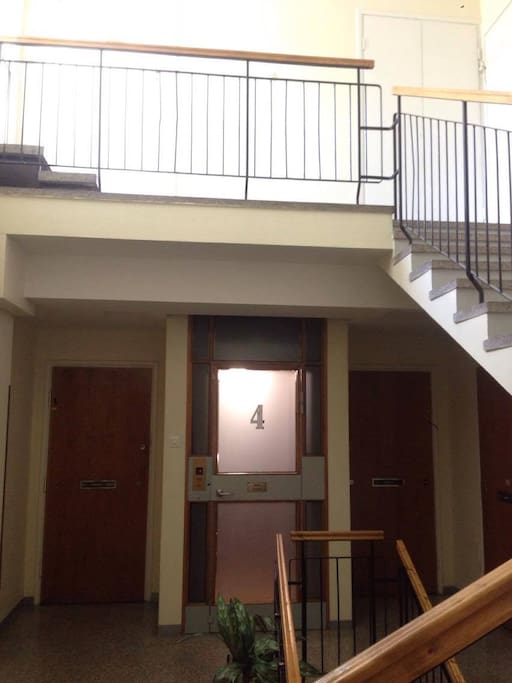 The hallway, 4th floor, stairs/elevator