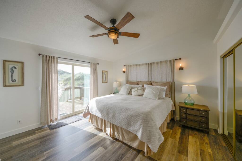 Master Bedroom, King bed with access to beach and flat screen TV