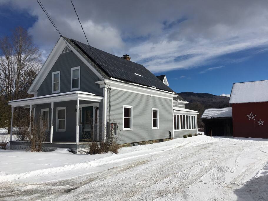 2,700 square foot farmhouse and 2-acre yard complete with classic red barn.