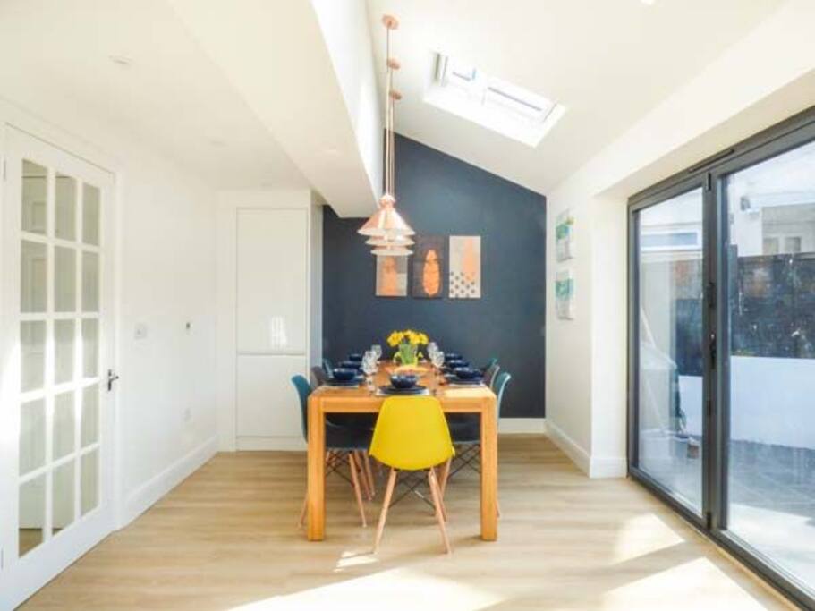 Solid oak table and eiffel chairs. Seating for 8 guests