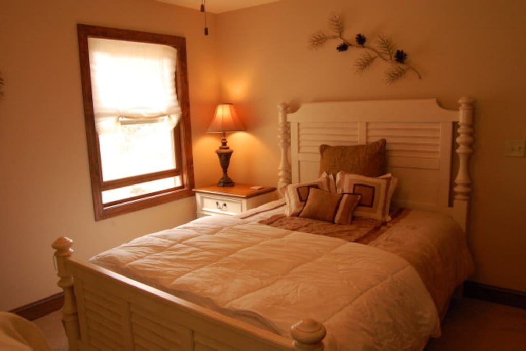 Queen bed with dresser...open the window to hear the creek