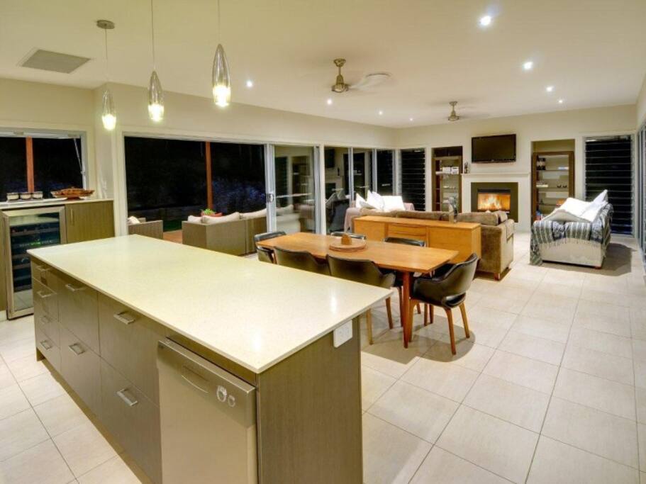 Living Area with fireplace leads out onto deck and pool
