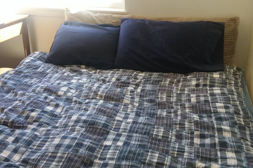 Comfortable bed with fresh sheets and a down comforter. More blankets are available.