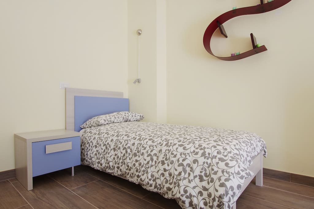 camera tripla particolare letto singolo