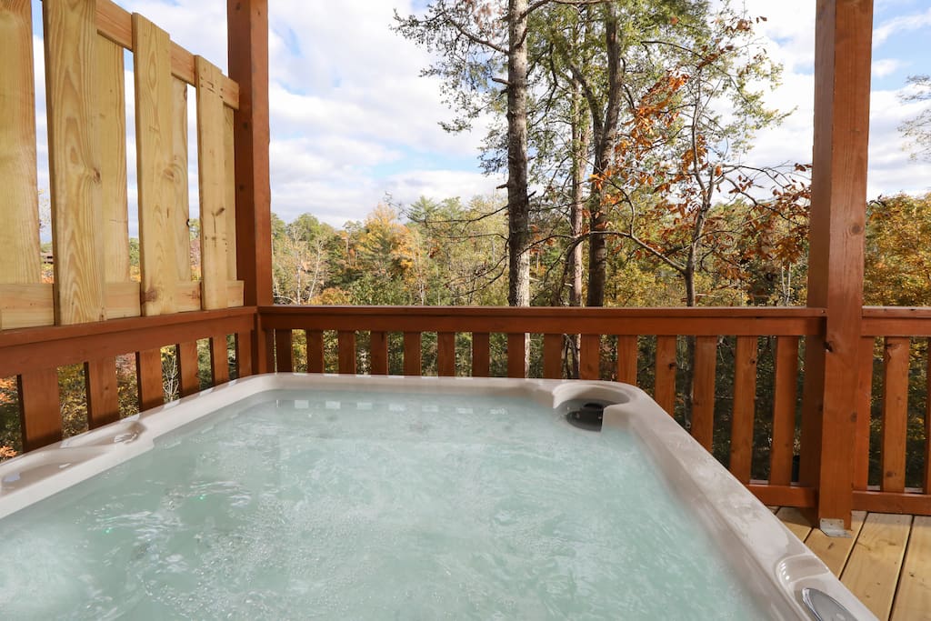 Soothe your cares away in this private hot tub on the lower deck.