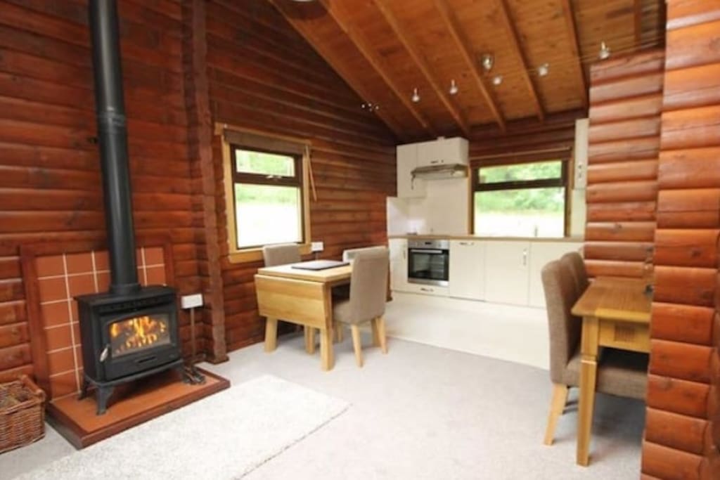 Living room/kitchen from open plan lounge. Dishwasher/washing machine etc