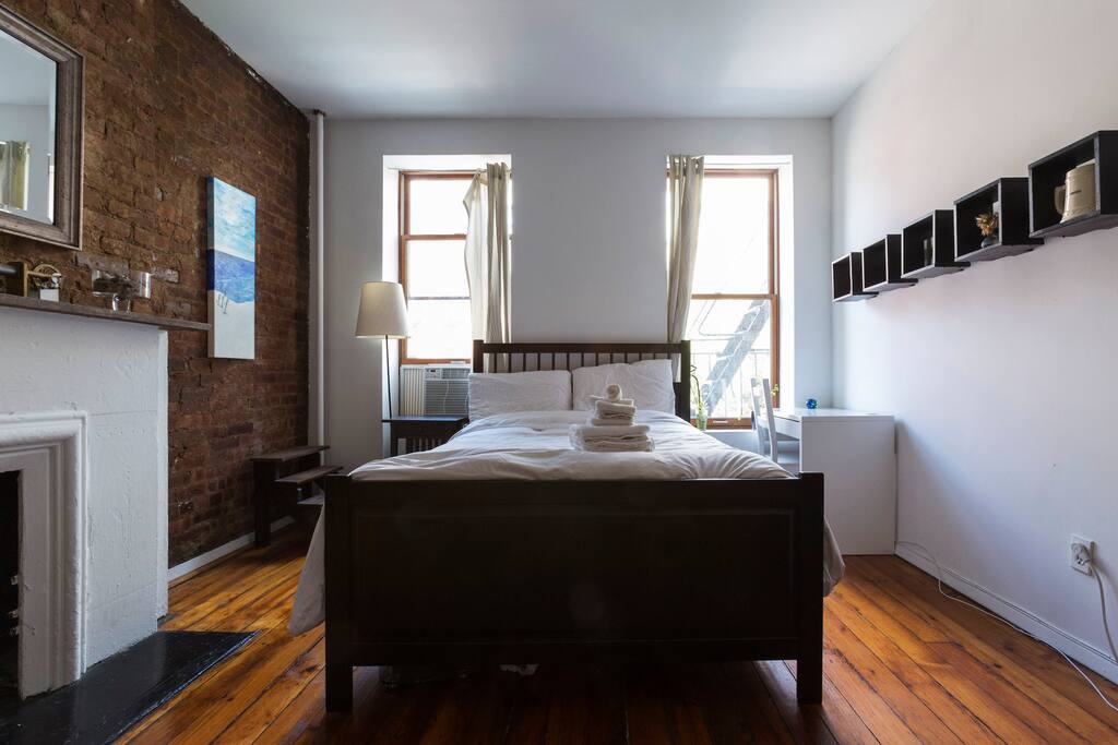 Beautiful large windows and personal touches throughout the apartment.