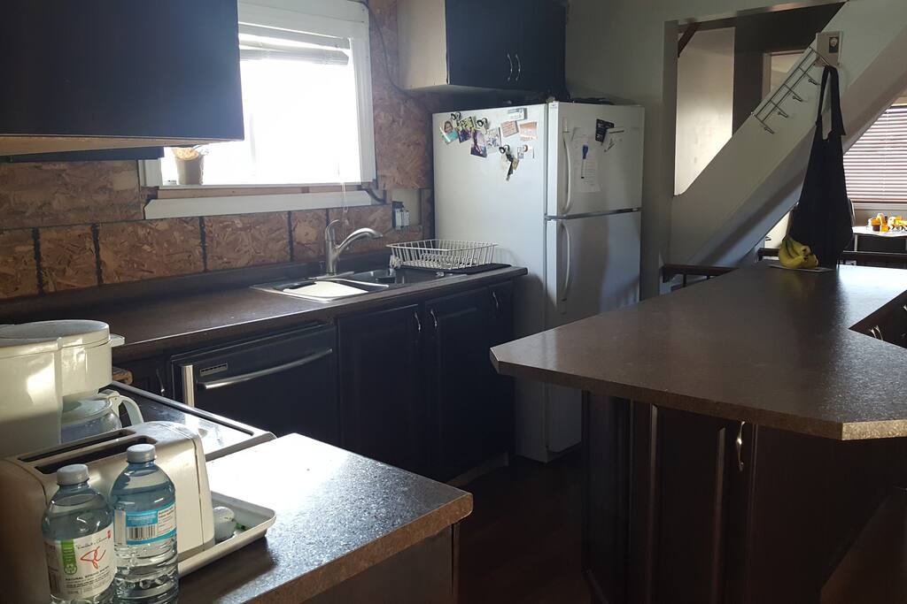 Shared kitchen space: fridge, stove, coffee maker, toaster, electric kettle, knives, pots & pans are all available for use.
