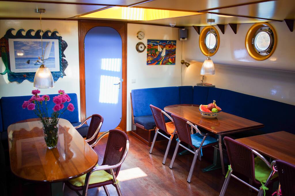 The living space has comfortable sofas, and fits more than twenty people