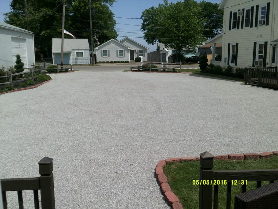 Standing on Porch overlooking Driveway and Entertainment Strip.