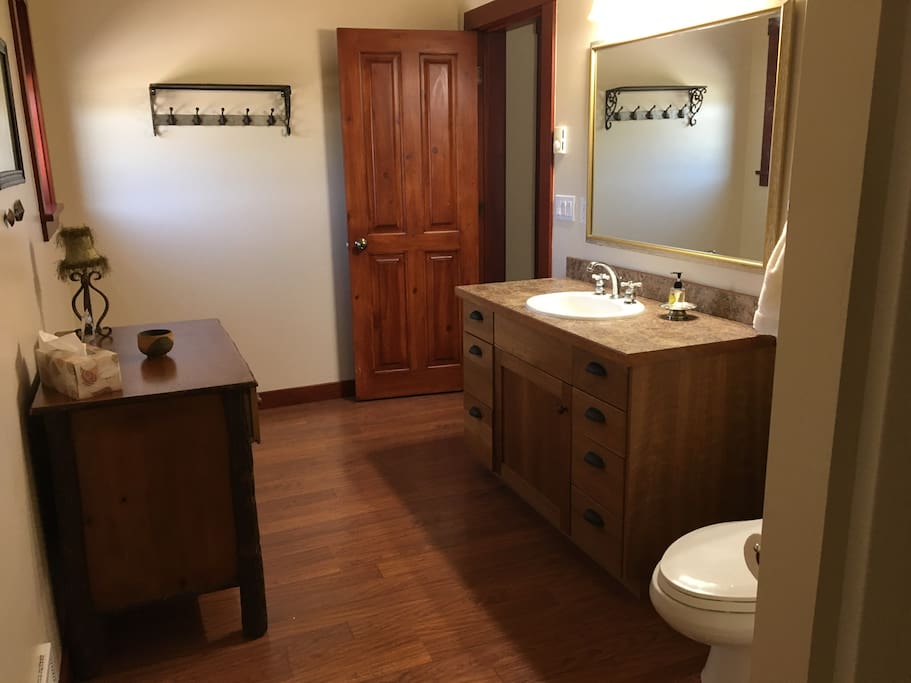 Spacious Bathroom with shower.