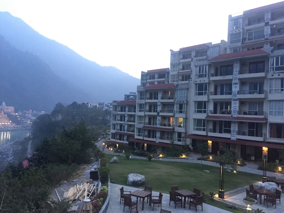 Our privately owned apartment at the Aloha resort . This is the front side of the complex which has huge balconies to enjoy the view of Himalayas mountains ranges with Ganges flowing by ..
The swimming pool and Patio Restaurant is located here as well .