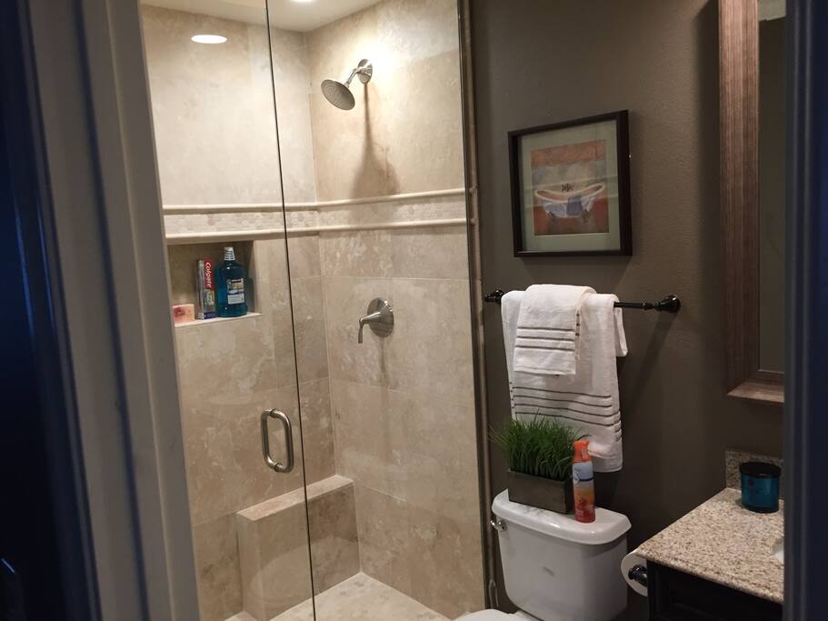 Newly installed travertine standup shower