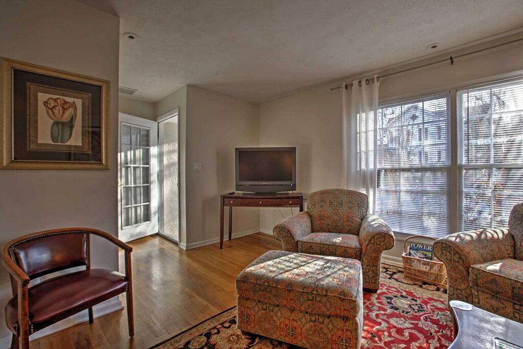 While you're reclining on plush seating, turn on the flat screen TV for your entertainment needs.