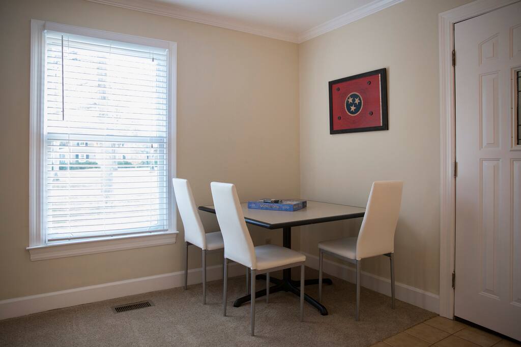 Card table for puzzles and games.