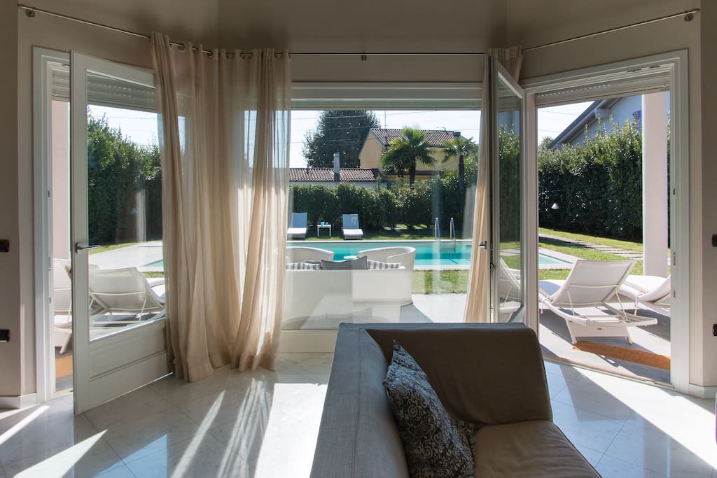 living room overlooking the pool