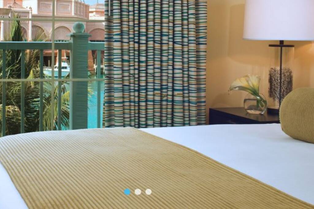 King size bed w/ view of harbor