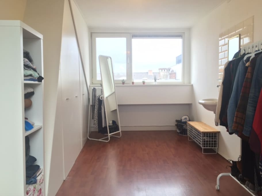 Big windows with lots of light. The also have remote controlled blackout blinds if you want to sleep in!
Shelves will be cleared for you to use.