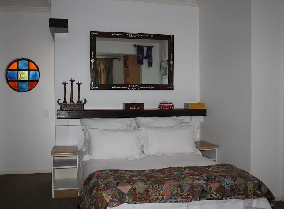 Studio our garden facing bedsitter, comfortable for two pax, even has a spare bed / couch.