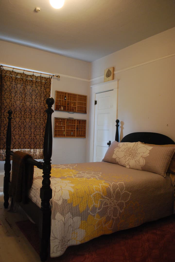 Main floor bedroom. queen bed.