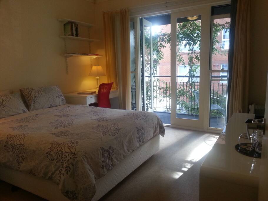 bedroom with balcony