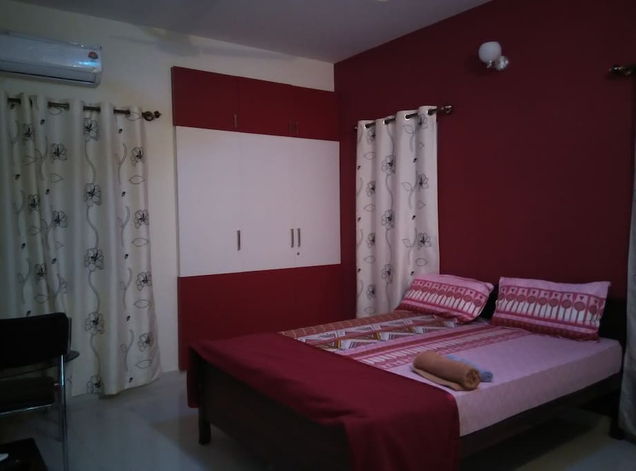 Air conditioned room well furnished