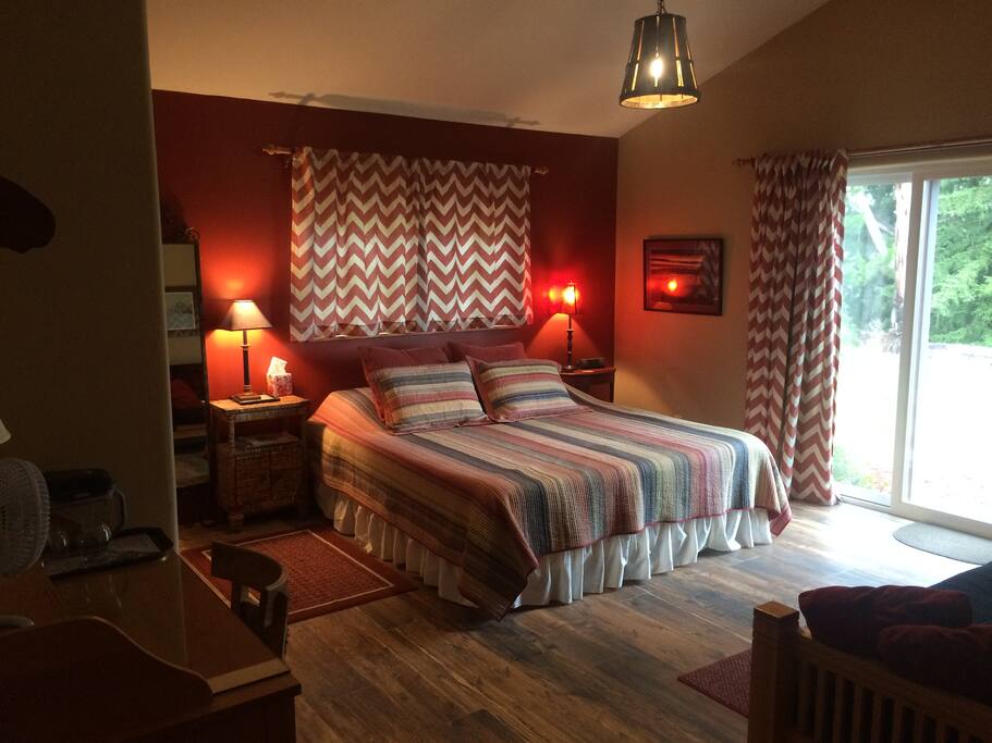 Private room with Cal King bed & access to private back yard.