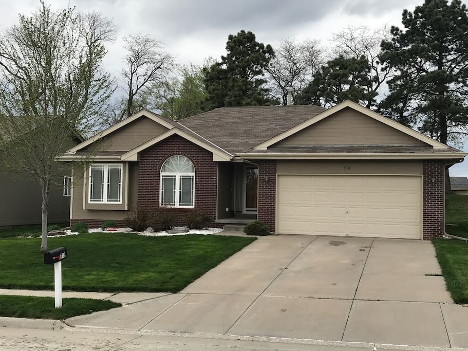 Front of house! This is the door you will use to enter upon initial arrival and feel free to park in the driveway!