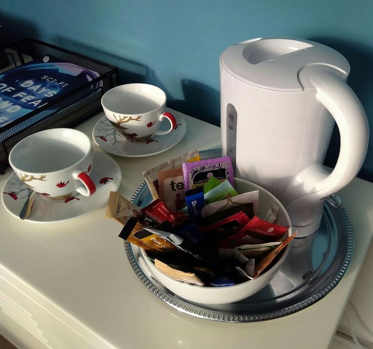 There's a kettle in the room with a selection of coffee and teas.