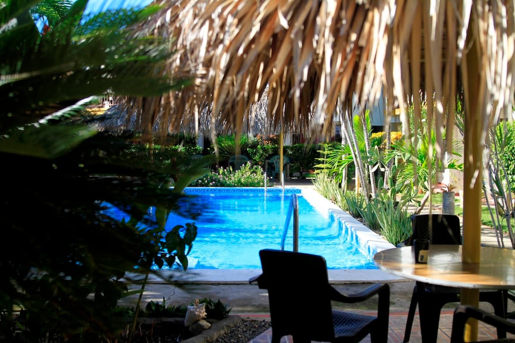 Just a few steps to a shady table by the pool