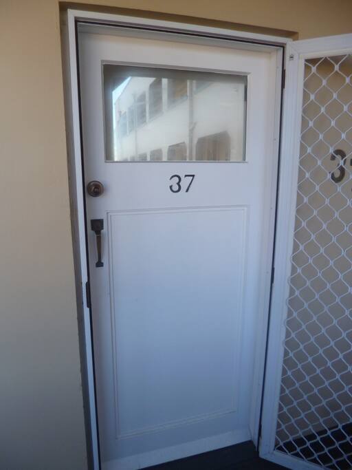 Front door with two secure locks with a lockable screen door.