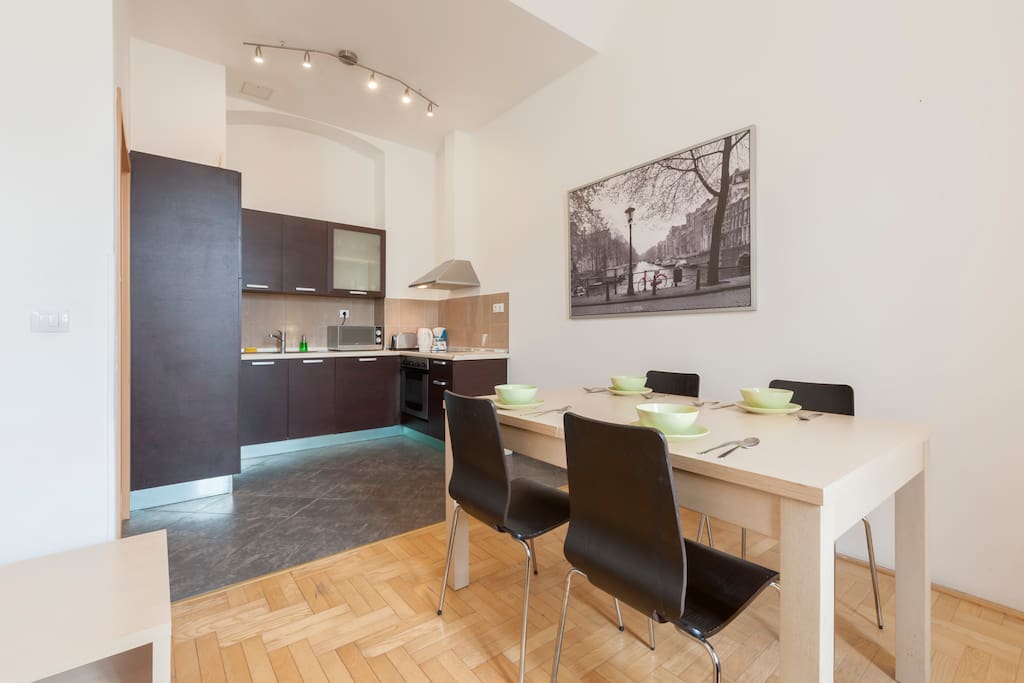 The dining table, to the left is the American kitchen