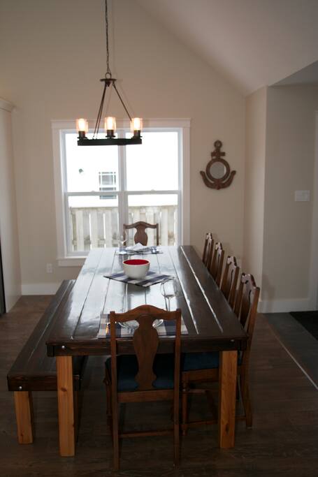 Kitchen table seats 10. Great for big dinners or games night.