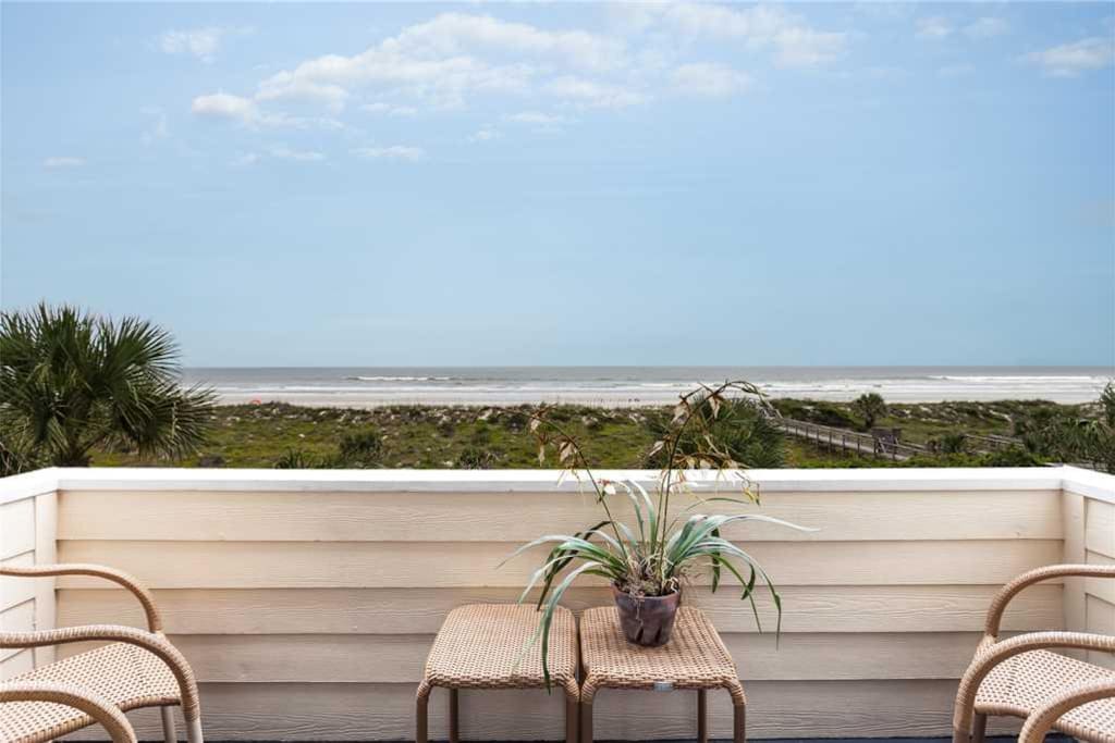 Cozy as a ship's cabin, our private balcony overlooks the ocean. - You'll feel as though you've got a front-row seat for the sunr