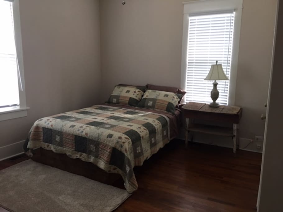 Queen bed with cozy bedding