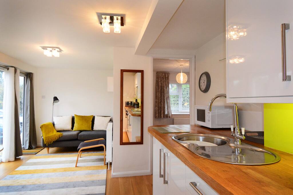 Open-plan living-dining-kitchen area.