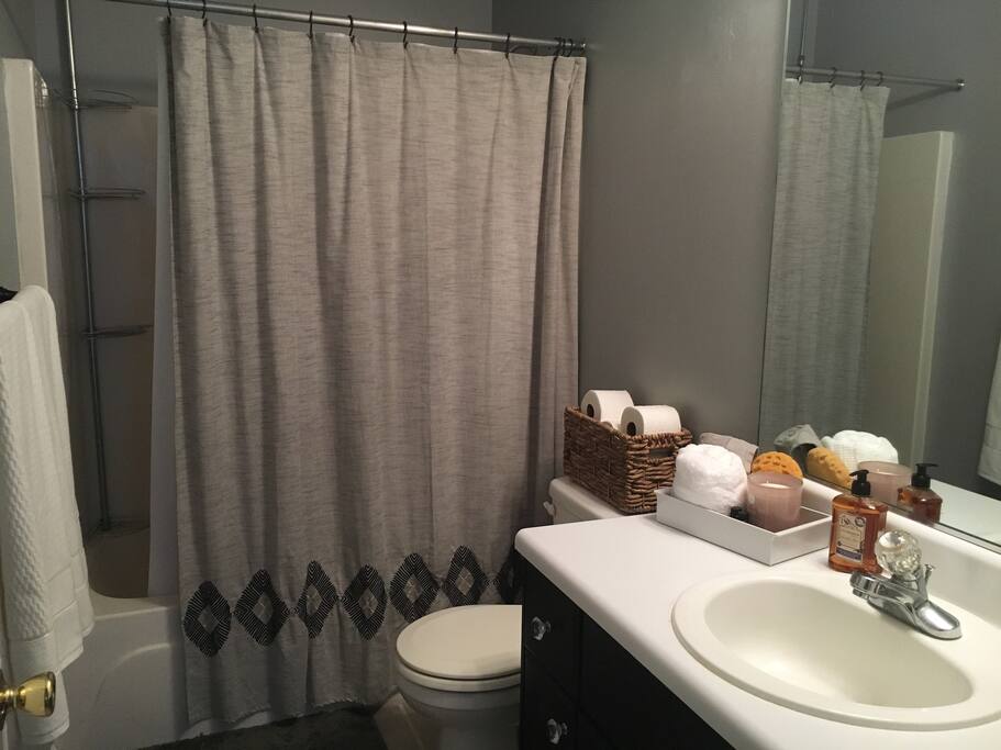 Guest bathroom - we have towels, soap, shampoo and conditioner for you! Also we do have extra unopened tooth paste, tooth brushes, and razors. If you need anything, just ask!