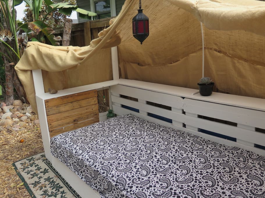 Our handmade gypsy outdoor couch. It's perfect to relax reading, drinking a glass of wine, or just watching the stars.