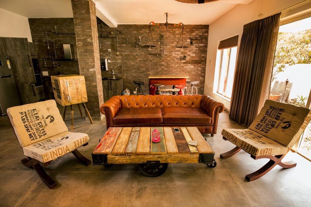 Living Room ! And the bar behind ! A perfect spot to start your evenings with a glass of wine !