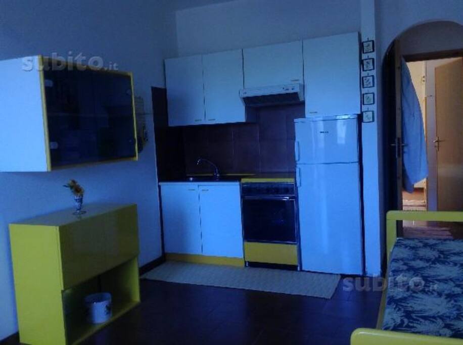 ambiente comune cucina più divano letto
