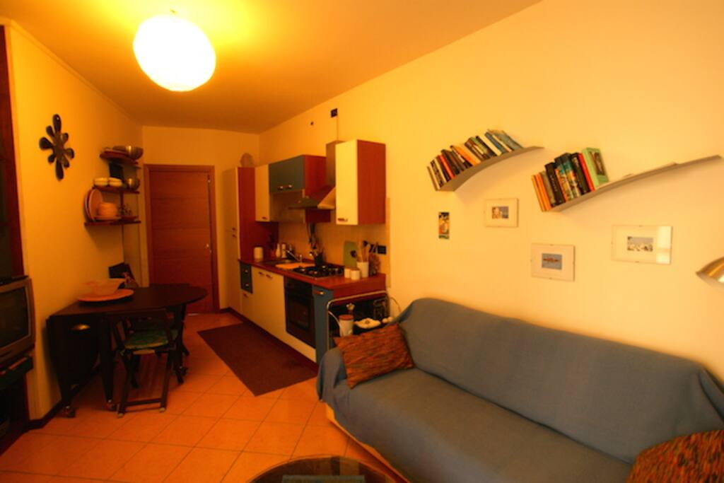 living room and kitchen with king size sofa bed